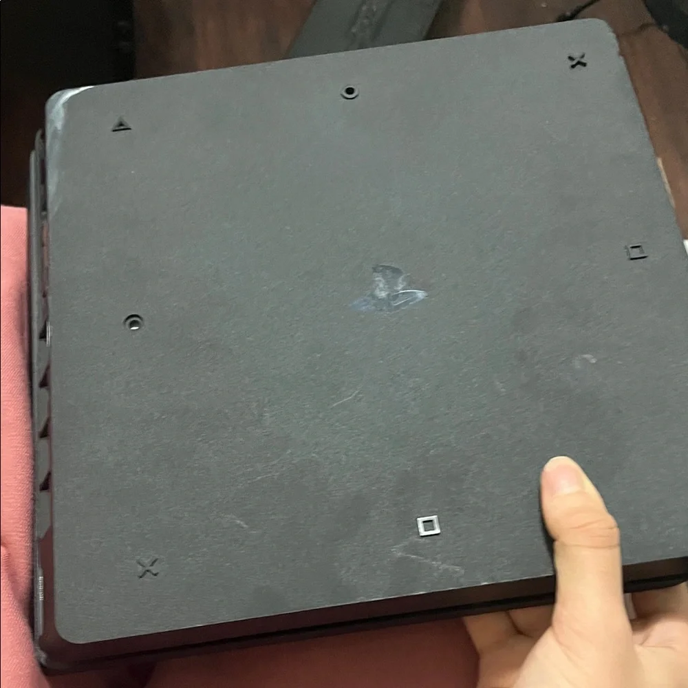 Sony PlayStation 4 Console with Black and Blue Controllers